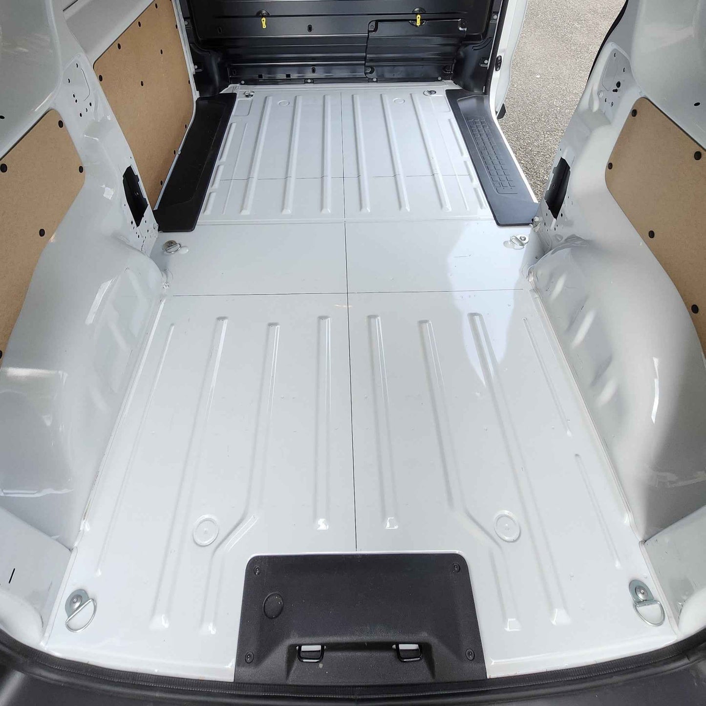 La cabine de chargement d'un véhicule utilitaire qui n'est pas équipé d'un plancher